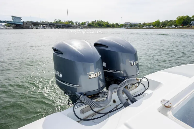Slide: The Image of 2013 Yellowfin 32 Offshore boat with twin Yamaha 300 outboard engines on water. - 29