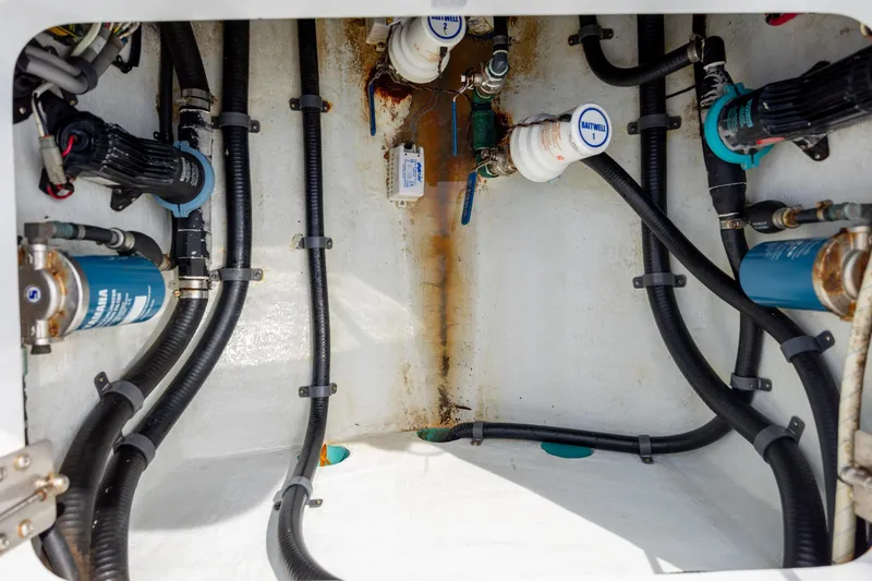 Slide: The Image of 2013 Yellowfin 32 Offshore boat plumbing and wiring system. - 30