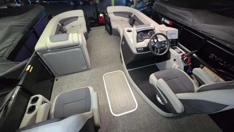 The Image of Interior of 2024 Barletta CABRIO 22 UC with gray seating and helm console. - 0