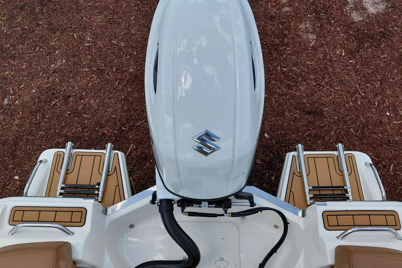 Slide: The Image of Top view of 2026 Pioneer 202 Islander boat engine and deck details. - 34