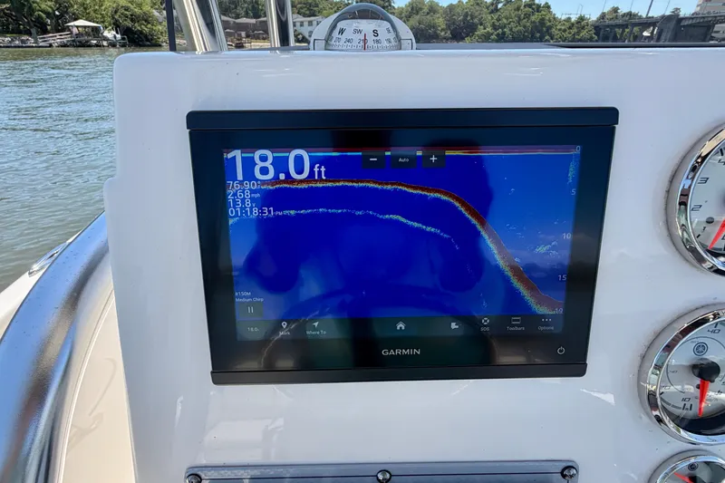 Slide: The Image of Garmin fishfinder display on 2023 Key West 189 FS boat, showing depth and speed. - 10