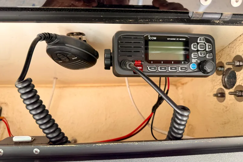 Slide: The Image of VHF marine radio installed on a 2023 Key West 189 FS boat. - 14