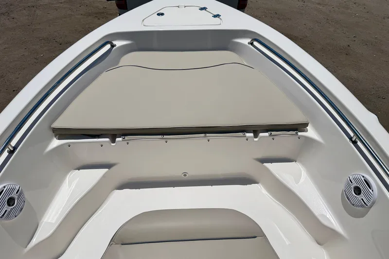 Slide: The Image of 2023 Key West 189 FS boat interior with cushioned seating and speakers. - 16