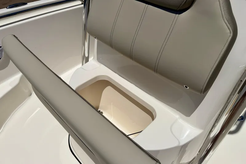 Slide: The Image of 2023 Key West 189 FS boat seat with storage compartment open. - 19