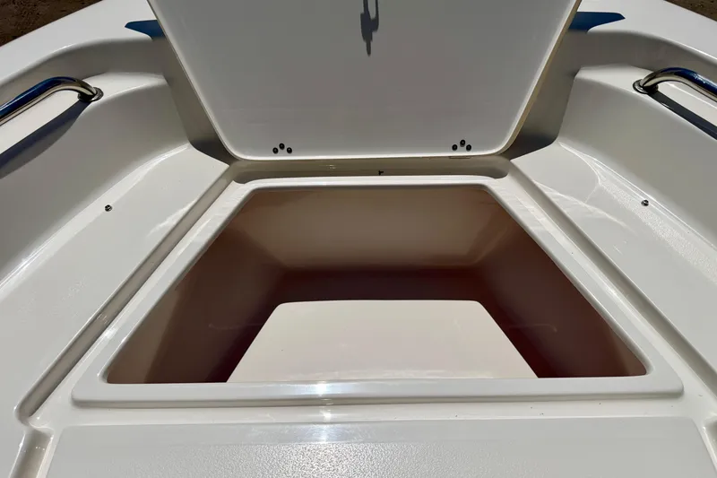 Slide: The Image of Open storage compartment on 2023 Key West 189 FS boat, showcasing spacious interior. - 20
