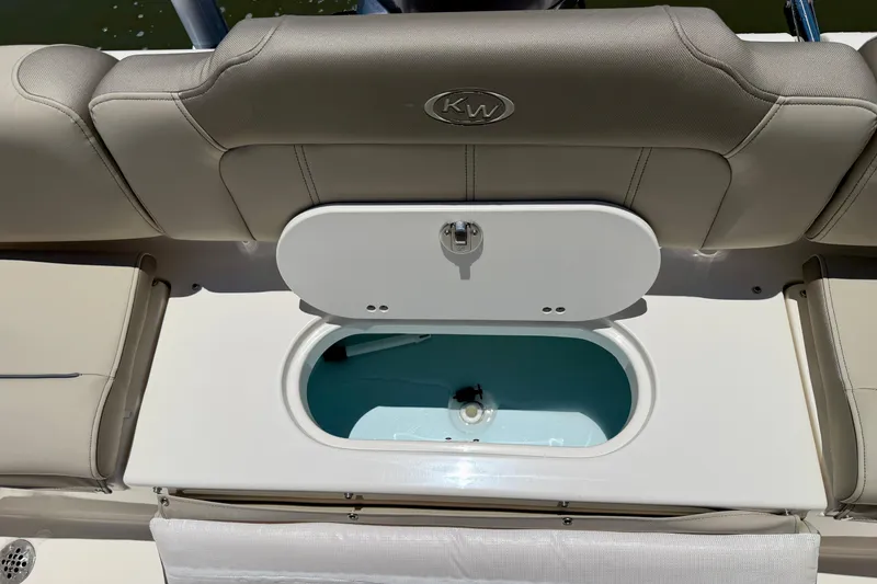 Slide: The Image of 2023 Key West 189 FS boat interior with open storage compartment. - 24