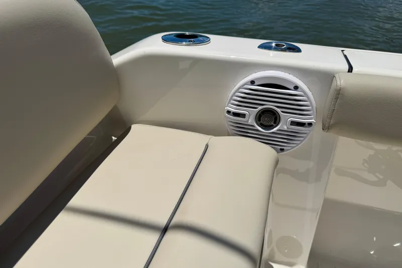 Slide: The Image of Interior of 2023 Key West 189 FS boat with speaker and seating detail. - 27