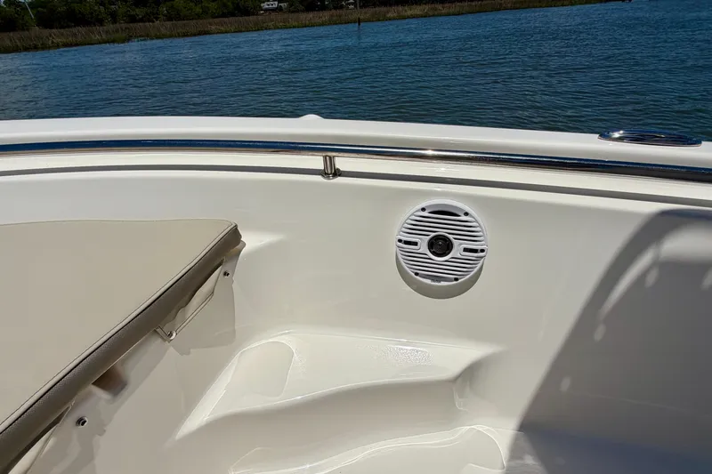 Slide: The Image of 2023 Key West 189 FS boat interior with speaker and cushioned seating. - 28