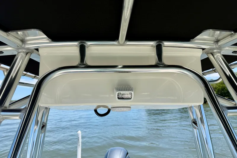 Slide: The Image of 2023 Key West 189 FS boat interior with stainless steel frame and water view. - 30