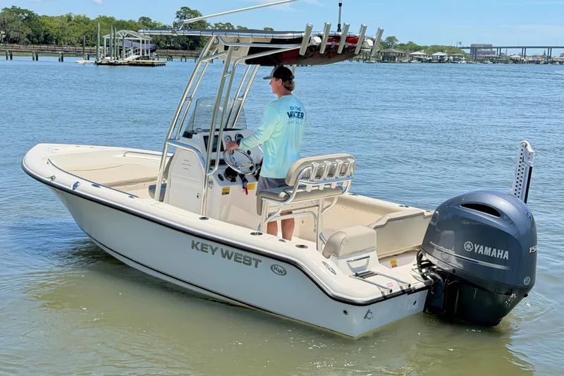 Slide: The Image of 2023 Key West 189 FS boat with Yamaha engine on calm water. - 7