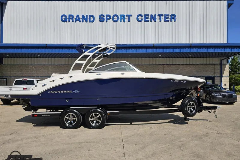 The Image of 2016 Chaparral 244 Sunesta boat on trailer at Grand Sport Center. - 1