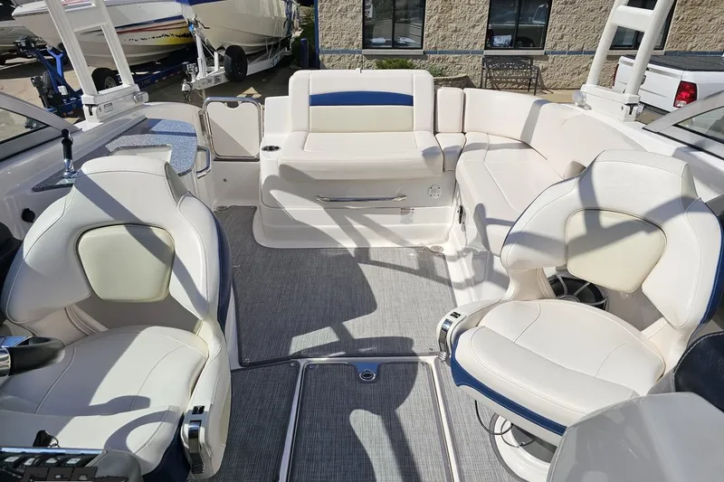 Slide: The Image of Interior of 2016 Chaparral 244 Sunesta boat with plush seating and modern design. - 106