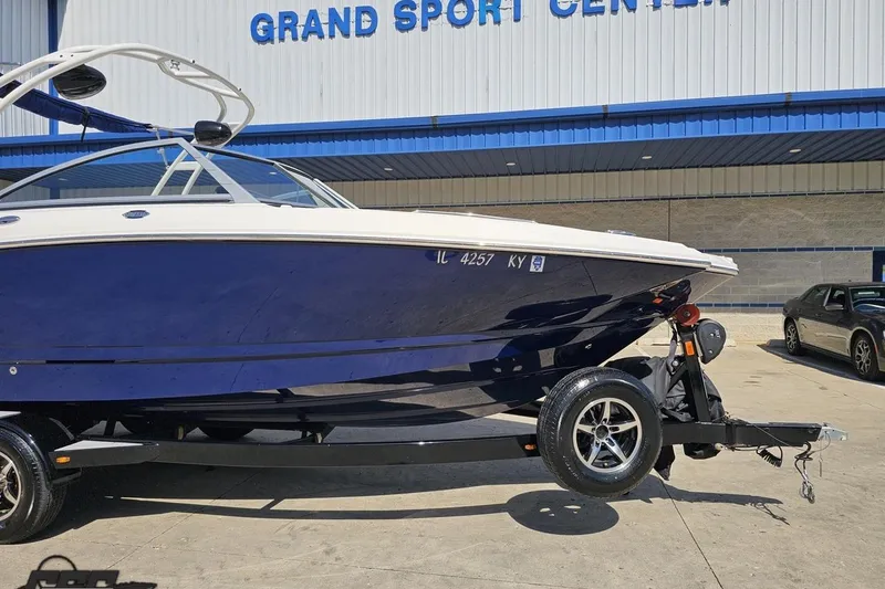 Slide: The Image of 2016 Chaparral 244 Sunesta boat on trailer at Grand Sport Center. - 15