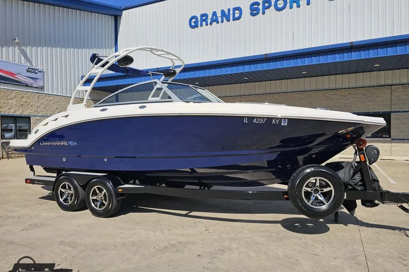 Slide: The Image of 2016 Chaparral 244 Sunesta boat on trailer outside Grand Sport Center. - 16