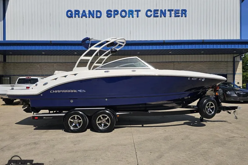 Slide: The Image of 2016 Chaparral 244 Sunesta boat on trailer at Grand Sport Center. - 2