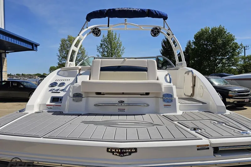 Slide: The Image of 2016 Chaparral 244 Sunesta boat with swim platform and arch, parked outdoors. - 35