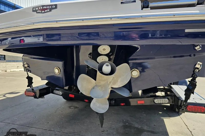 Slide: The Image of Rear view of 2016 Chaparral 244 Sunesta boat with propeller and trailer. - 37