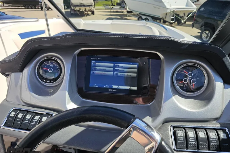 Slide: The Image of Dashboard of a 2016 Chaparral 244 Sunesta boat with Garmin GPS system. - 69