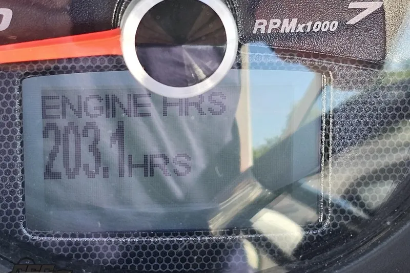 Slide: The Image of Close-up of Chaparral 244 Sunesta 2016 engine hour meter displaying 203.1 hours. - 73