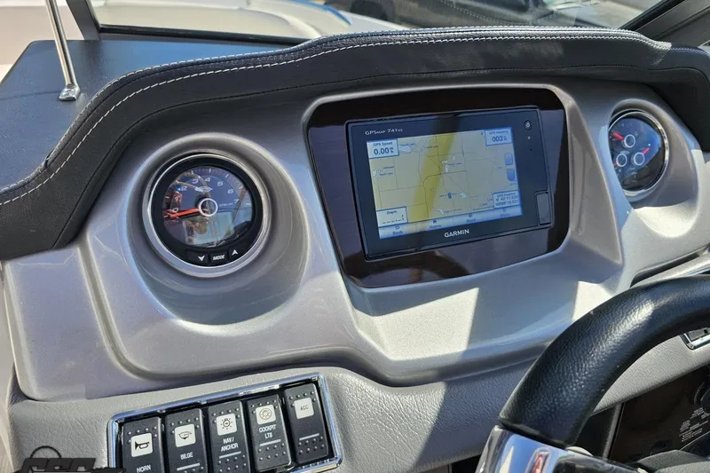 Slide: The Image of Dashboard of 2016 Chaparral 244 Sunesta with Garmin GPS and gauges. - 75