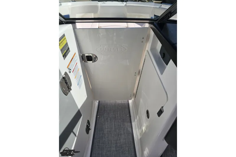 Slide: The Image of Interior view of 2016 Chaparral 244 Sunesta boat, featuring a sleek, modern design. - 81