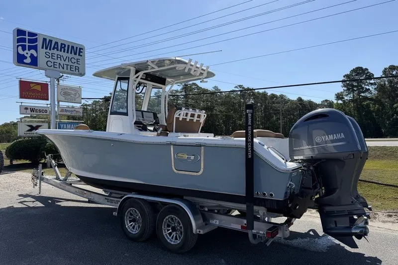 Slide: The Image of 2024 Sea Hunt Ultra 265 SE boat on trailer at Marine Service Center. - 4