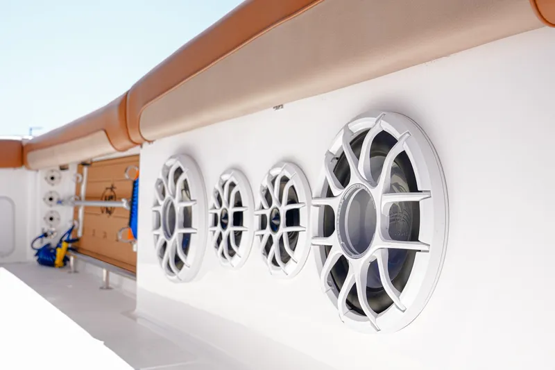Slide: The Image of 2024 NauticStar 292 Legacy boat speakers and seating detail. - 10