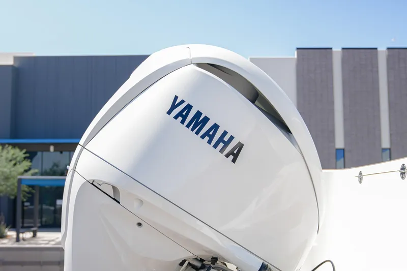 Slide: The Image of Yamaha outboard motor on 2024 NauticStar 292 Legacy boat, outdoor setting. - 27