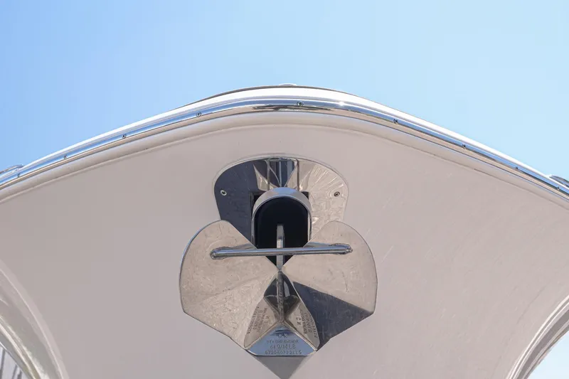Slide: The Image of Bow view of 2024 NauticStar 292 Legacy boat with anchor detail against clear sky. - 33