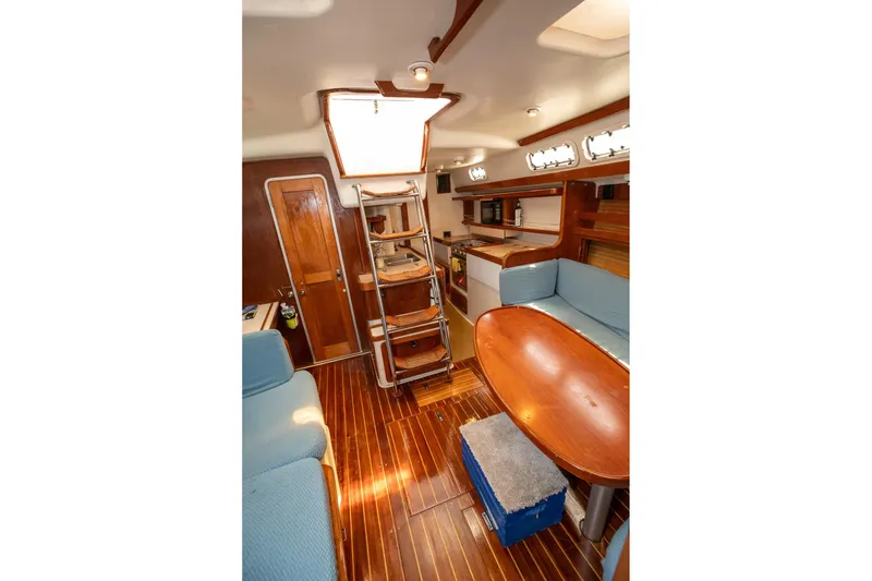 Slide: The Image of Interior of 1994 Morgan Catalina 38 yacht kitchen with wood cabinetry and appliances. - 28
