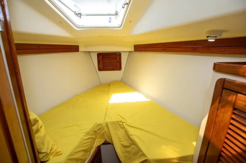 Slide: The Image of Bathroom interior of 1994 Morgan Catalina 38 yacht, featuring sink and mirror. - 38