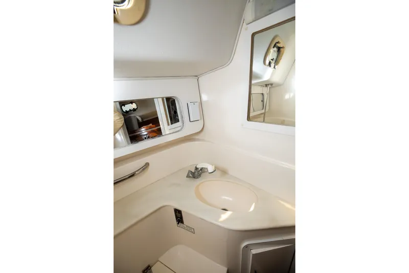 Slide: The Image of Bathroom interior of 1994 Morgan Catalina 38 yacht, featuring sink and mirror. - 41