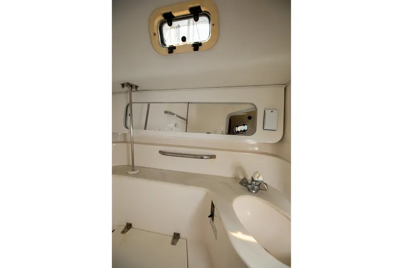 Slide: The Image of Cozy cabin interior of 1994 Morgan Catalina 38 sailboat with yellow bedding and nautical decor. - 42