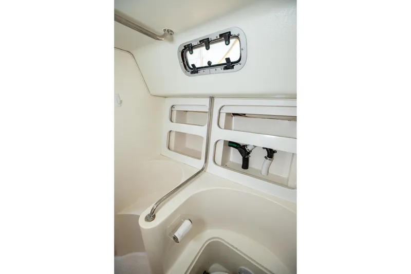 Slide: The Image of Control panel of a 1994 Morgan Catalina 38 sailboat with navigation and communication equipment. - 54