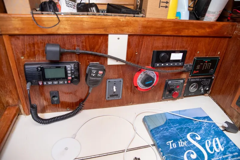 Slide: The Image of Yamaha 15 outboard motor on a 1994 Morgan Catalina 38 sailboat at a marina. - 57