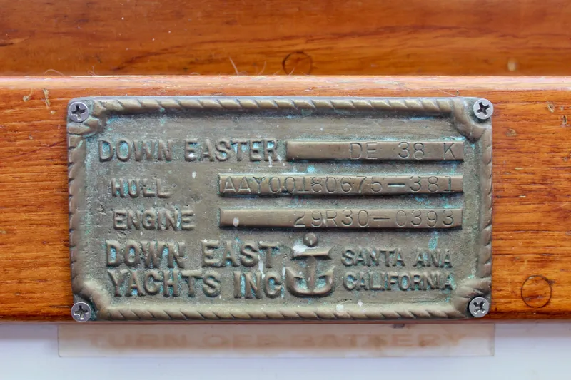 Slide: The Image of Plaque on 1975 Downeast 38 yacht, Santa Ana, California, displaying hull and engine details. - 30
