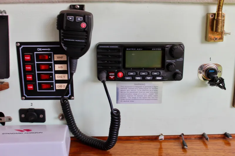 Slide: The Image of Control panel of a 1975 Downeast 38 boat with Standard Horizon radio equipment. - 41