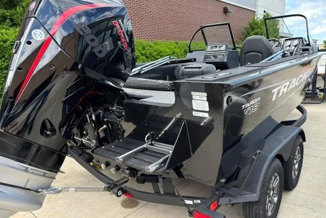 Slide: The Image of 2025 Tracker Targa V-19 WT Tournament Edition boat with powerful outboard motor. - 12