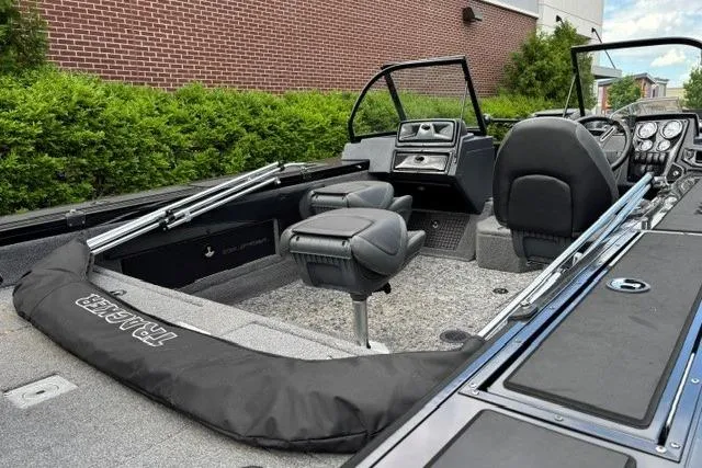 Slide: The Image of 2025 Tracker Targa V-19 WT Tournament Edition boat interior with seating and dashboard. - 5