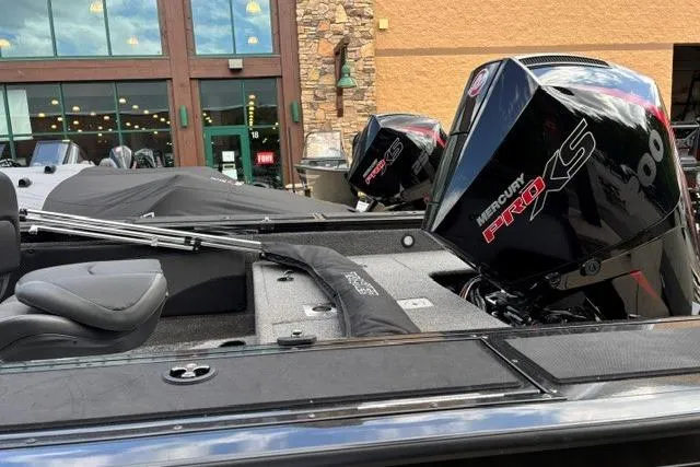 Slide: The Image of 2025 Tracker Targa V-19 WT Tournament Edition with Mercury Pro XS engines displayed outdoors. - 9