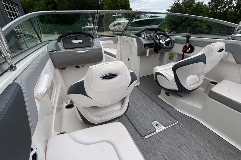 Slide: The Image of Interior of a 2021 Chaparral 23 SSi boat with modern seating and dashboard. - 18