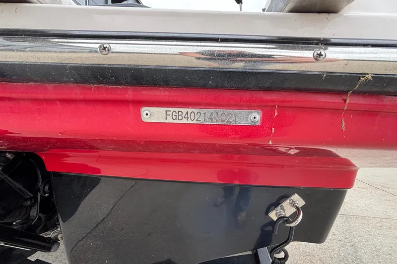 Slide: The Image of 2021 Chaparral 23 SSi boat with visible hull identification number plate. - 5