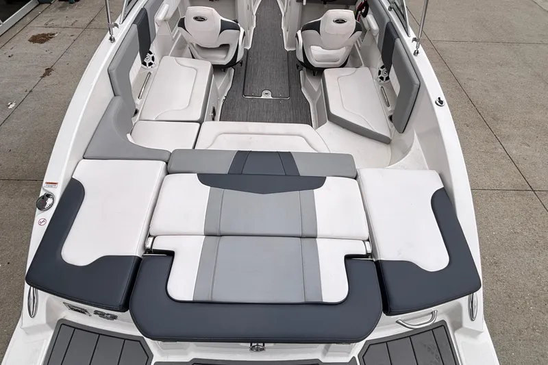 Slide: The Image of 2021 Chaparral 23 SSi boat interior with spacious seating and modern design. - 9