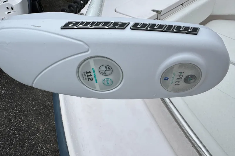 Slide: The Image of Minn Kota trolling motor with i-Pilot system on 2003 Grady-White Advance 257 boat. - 19