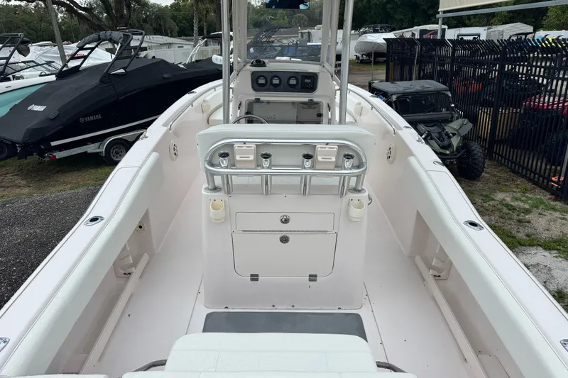 Slide: The Image of 2003 Grady-White Advance 257 boat interior with console and seating. - 4