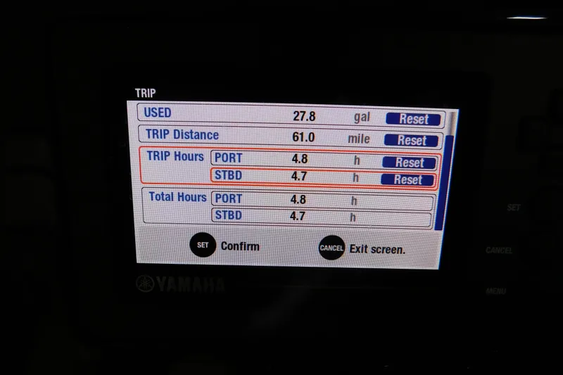 Slide: The Image of Yamaha trip display showing fuel usage, distance, and hours for Pursuit DC 266 Dual Console 2022. - 31
