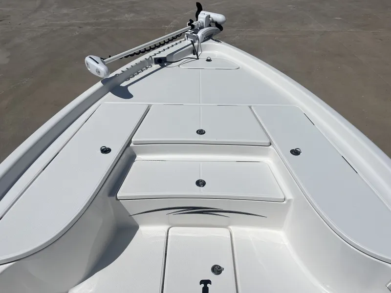 Slide: The Image of 2017 Blue Wave 2300 boat deck with trolling motor. - 12