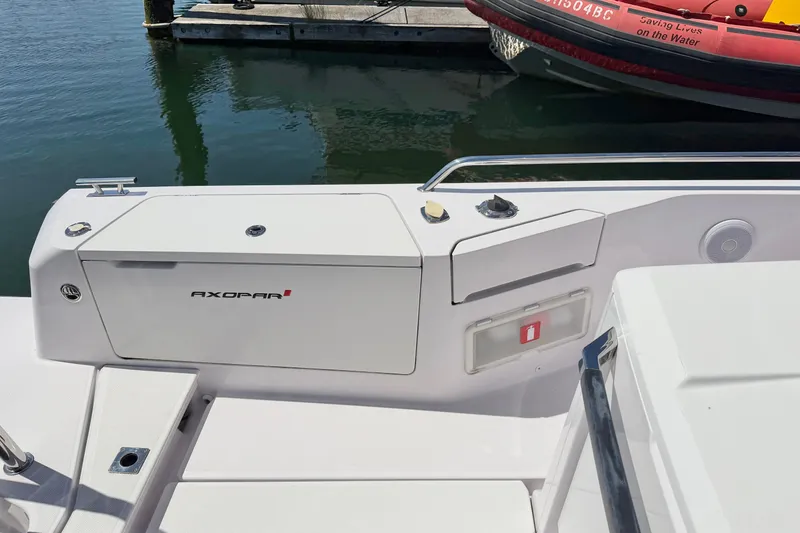 Slide: The Image of 2020 Axopar 37 XC Cross Cabin boat deck, featuring sleek design and modern amenities. - 11