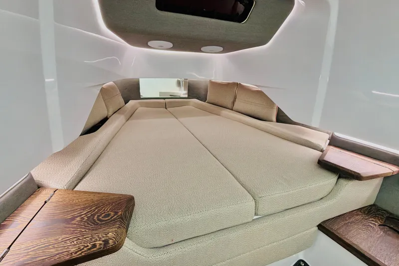 Slide: The Image of Luxurious interior cabin of 2020 Axopar 37 XC Cross Cabin with comfortable seating. - 33