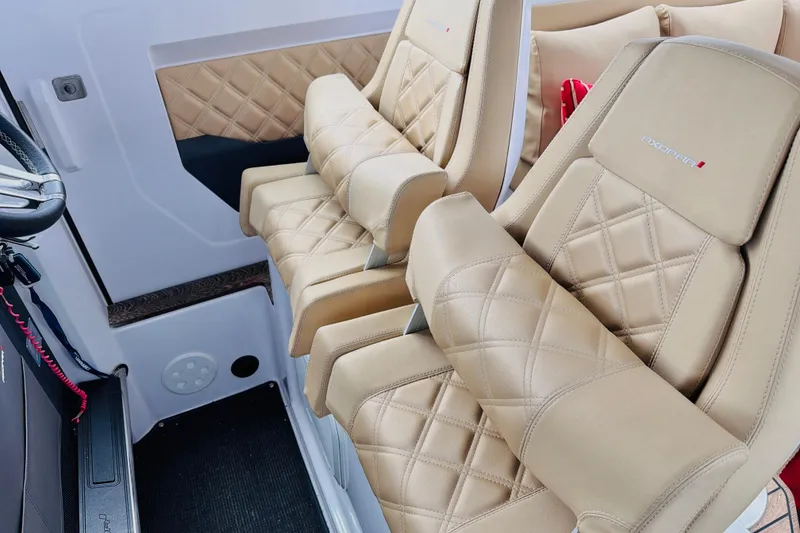 Slide: The Image of Luxurious beige leather seats in 2020 Axopar 37 XC Cross Cabin boat interior. - 28